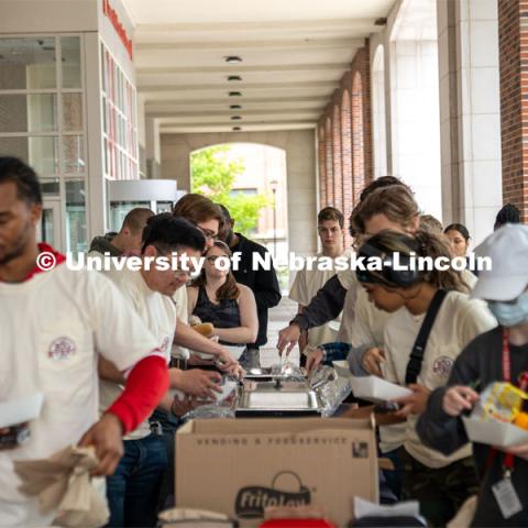 Student volunteers for the Big Event pick out a lunch before the start of the event. May 4, 2024. Photo by Kirk Rangel for University Communication.